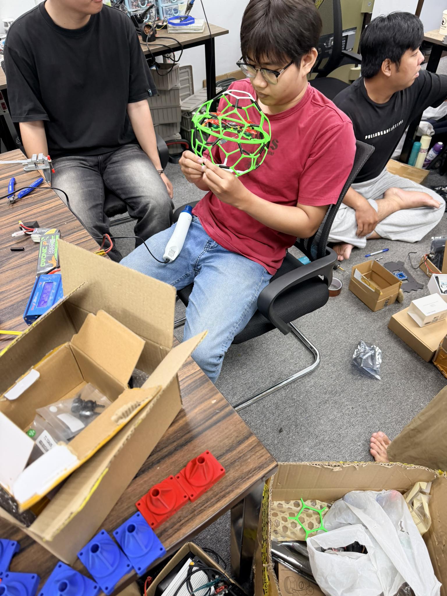 The Cookies team working together on the drone